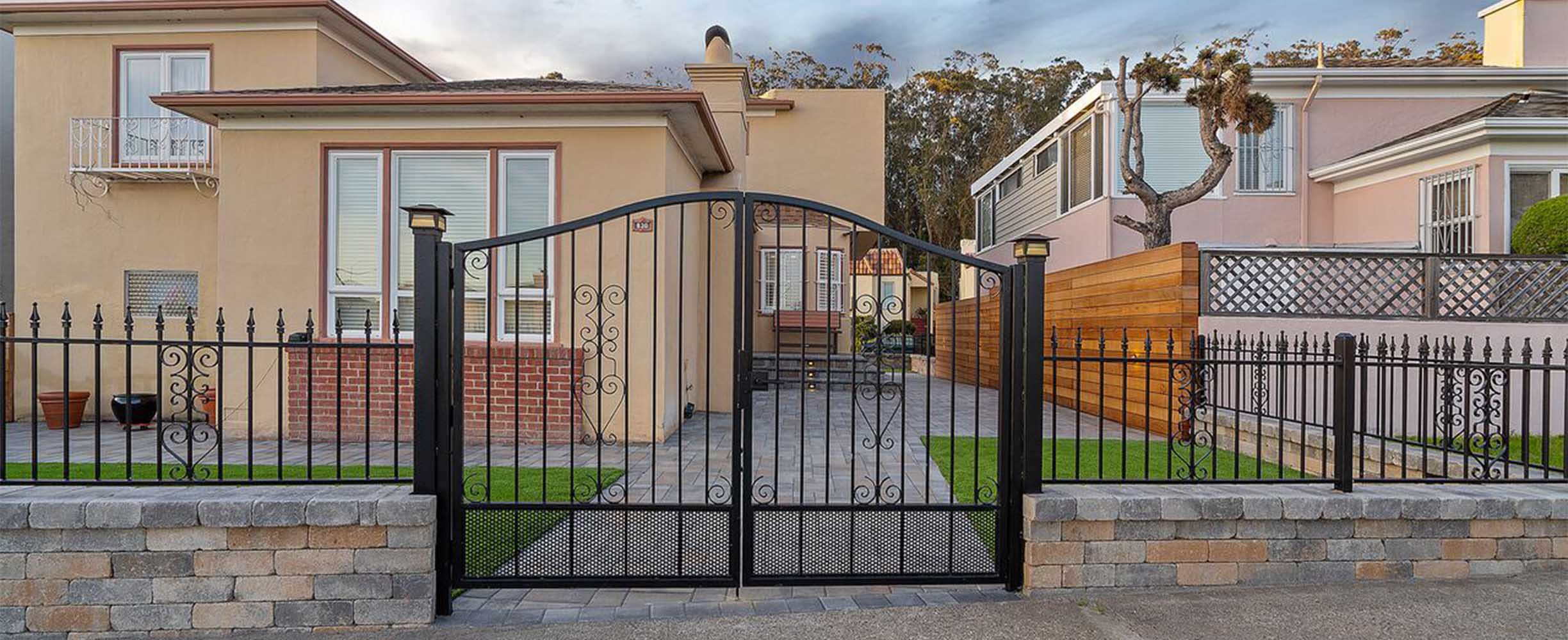 Stones wall and iron fence, design and installation.