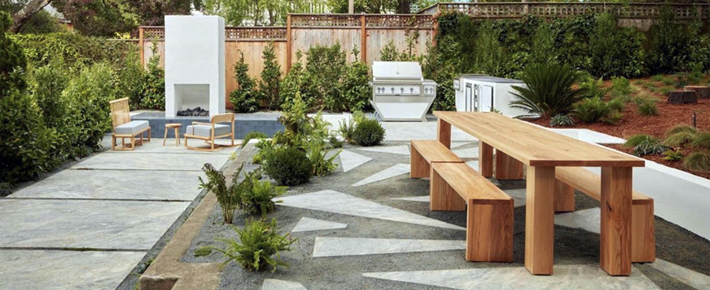 Landscaping in San Francisco, patio with grill, tables and fireplace.